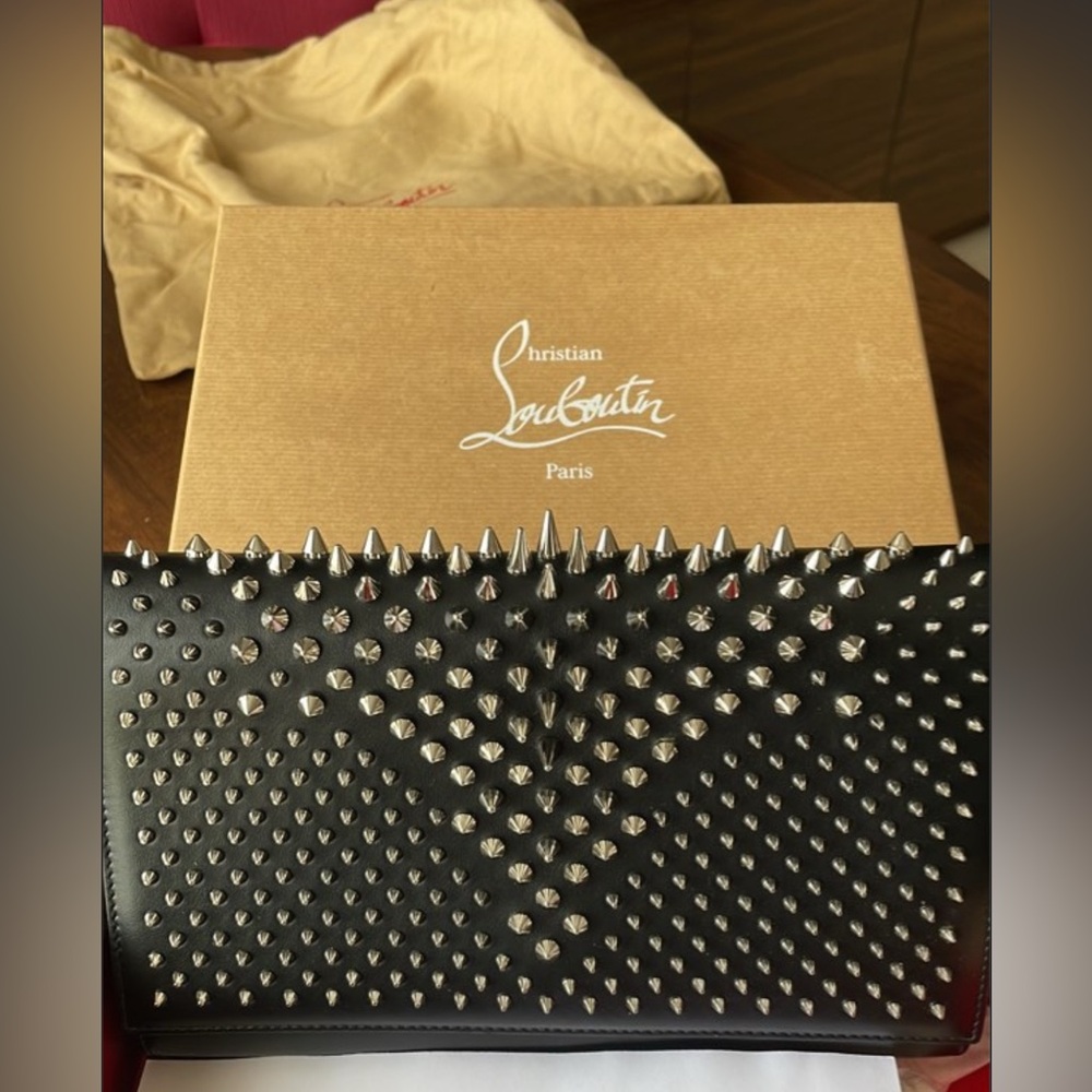 Black Leather clutch by Christian Louboutin